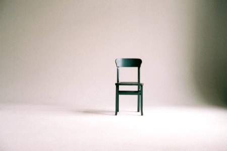 Green Wooden Chair On White Surface photo