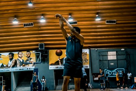 Black Haired Man Wearing Black Sleeveless Shirt And Black Shorts photo