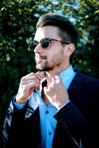 Man In Blue Dress Shirt And Black Formal Suit photo