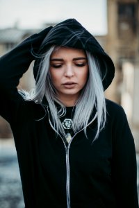 Woman In Black Zip-up Hoodie And Blonde Hair photo