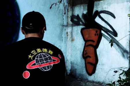 Person Looking At Graffiti