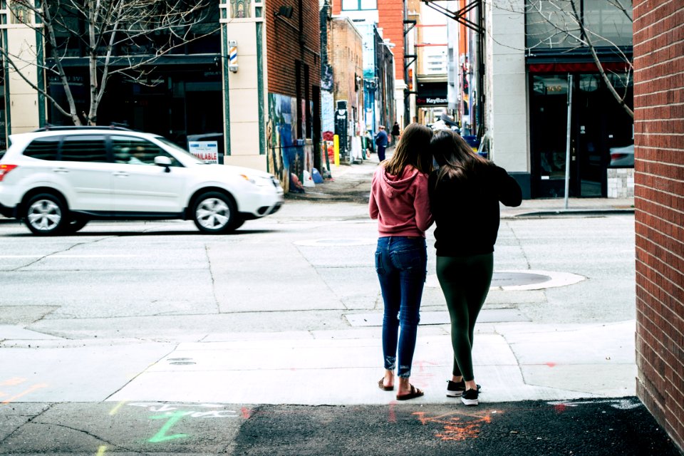 Two Woman Near Street Under Sky photo