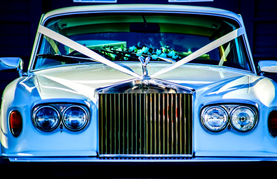Closeup Photo Of White Rolls Royce Vehicle
