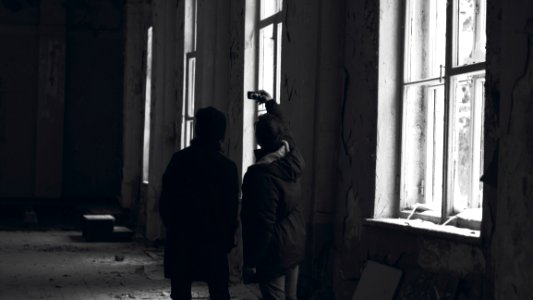 Two Persons Taking Photo