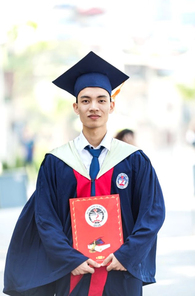 Man In Toga Holding Diploma