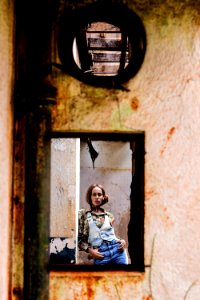 Woman Leaning On Wall photo