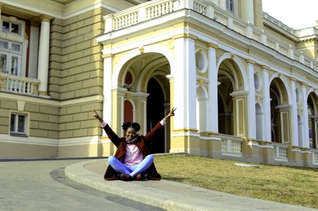 Photo Of Woman Sitting On Ground photo