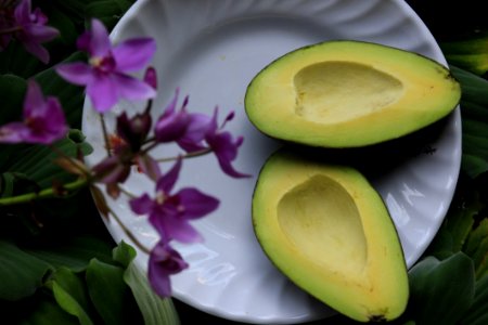 Sliced Avocado On White Ceramic Plate