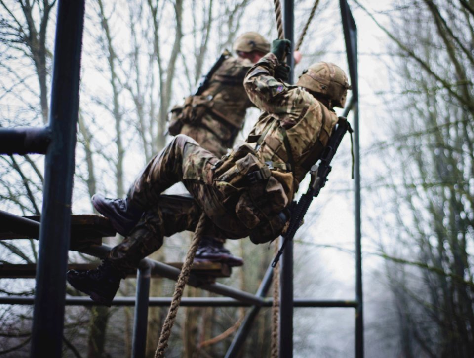 Soldier Climbing On Rope