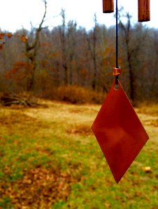 Shallow Focus Photography Of Red Hanging Decor photo