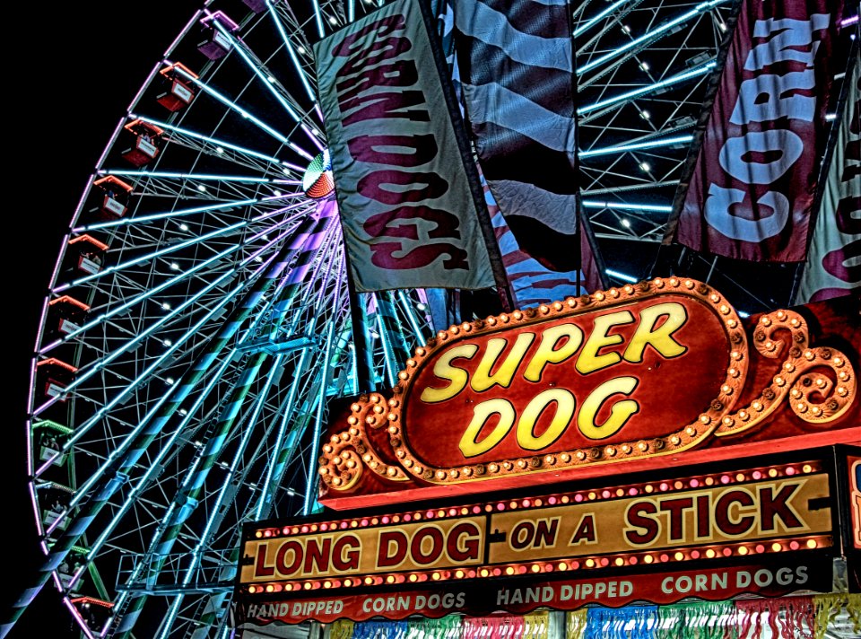 Super Dog Hot Dog Food Stall In Front Of Ferris Wheel During Nighttime