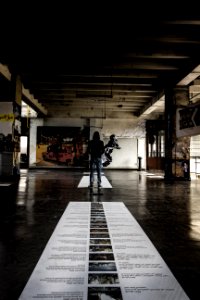 Person Standing On Ceramic Floor Tiles