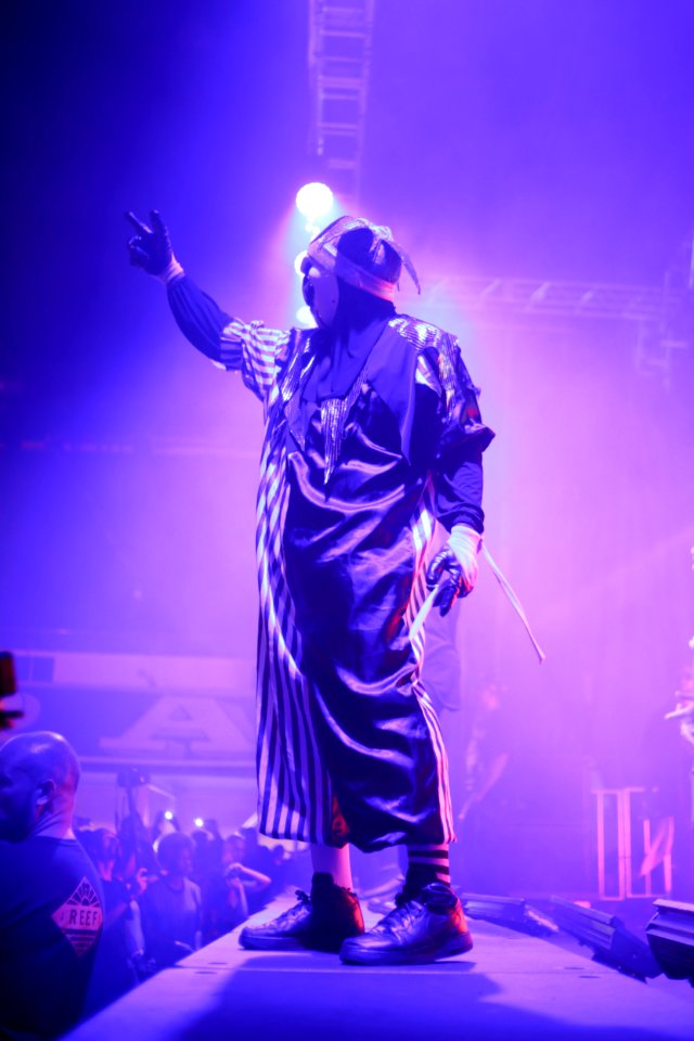 Man Standing On Stage