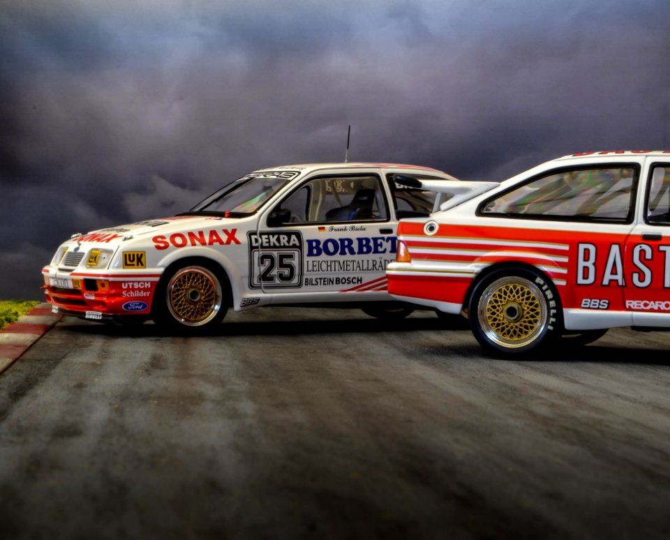 Photo Of Two White-and-red Race Cars