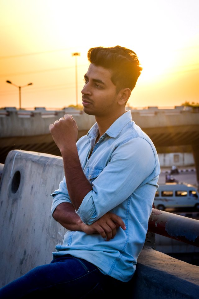 Man Wearing Blue Denim Dress Shirt