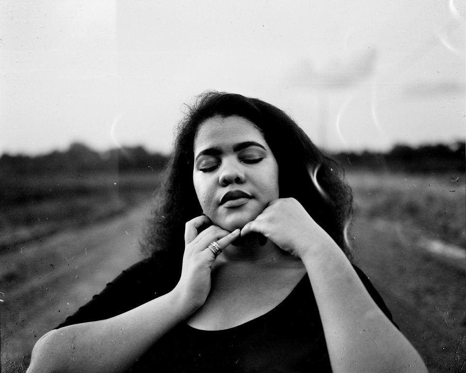 Grayscale Shallow Focus Photography Of Woman In Scoop-neck Top