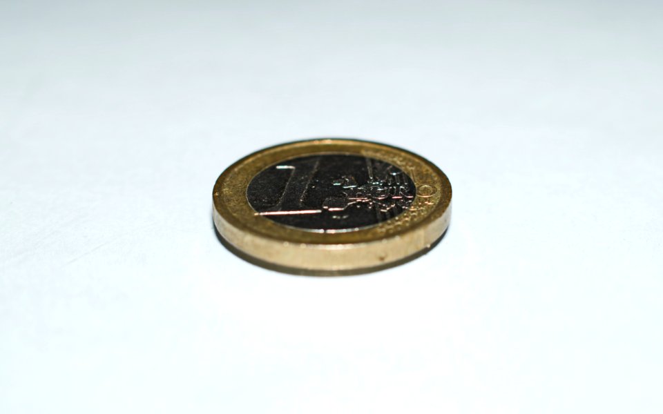 Gold-color Coin photo