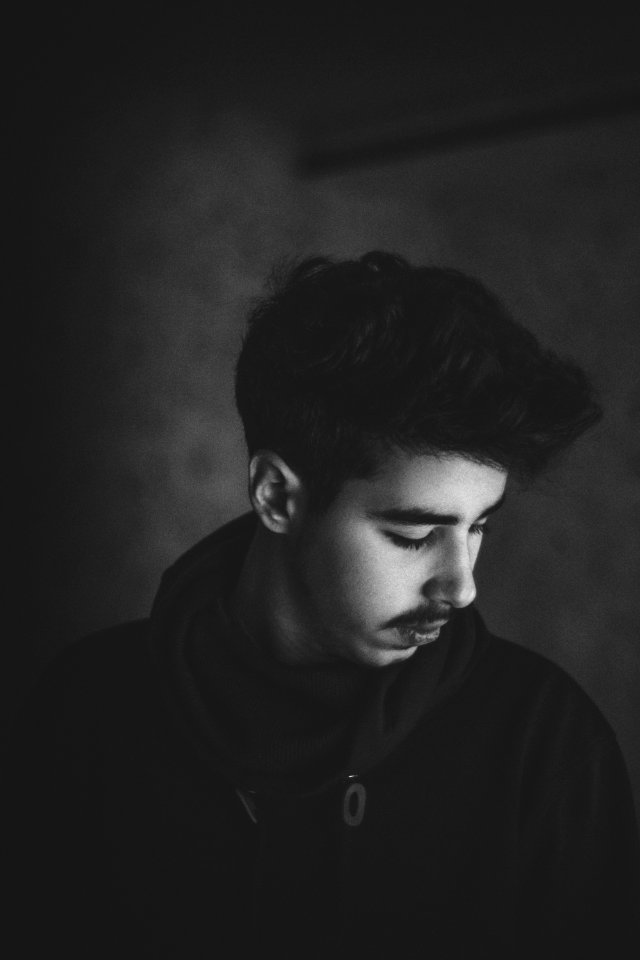 Man In Black Jacket Photo