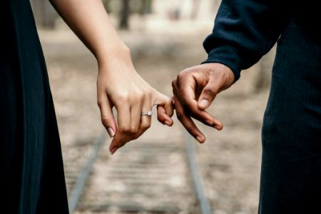 Man In Black Long-sleeved Shirt And Woman In Black Dress photo