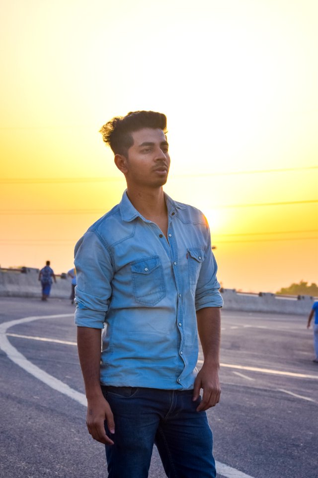 Man Wearing Blue Chambray Top