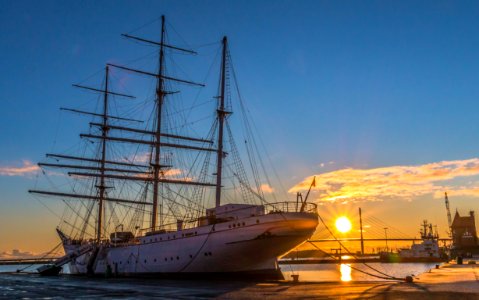 White Ship In Dock During Golden Hour