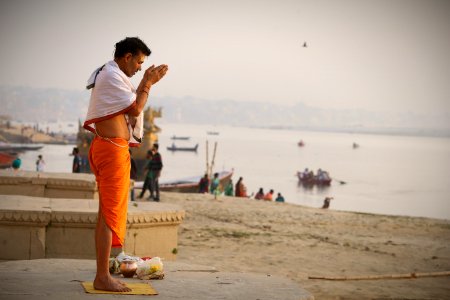 Man Meditating On Seashore photo