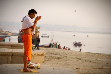 Man Meditating On Seashore
