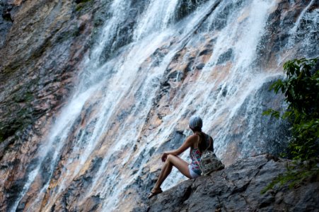 Woman Near Waterfalls