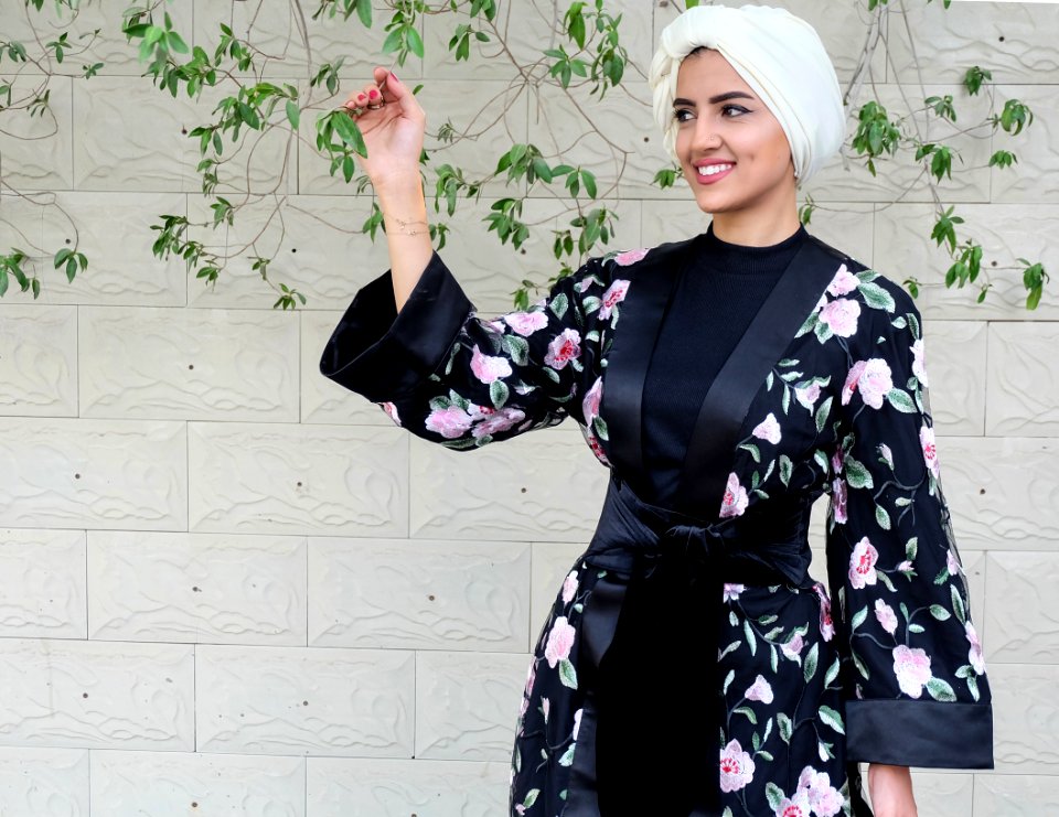 Woman Wearing Black And Pink Floral Kimono