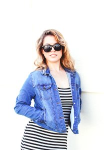 Woman Wearing Blue Denim Jacket