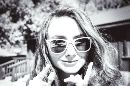 Grayscale Photography Of Woman Wearing Sunglasses photo