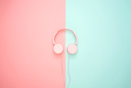 Pink Corded Headphones On Pink And Teal Wall photo