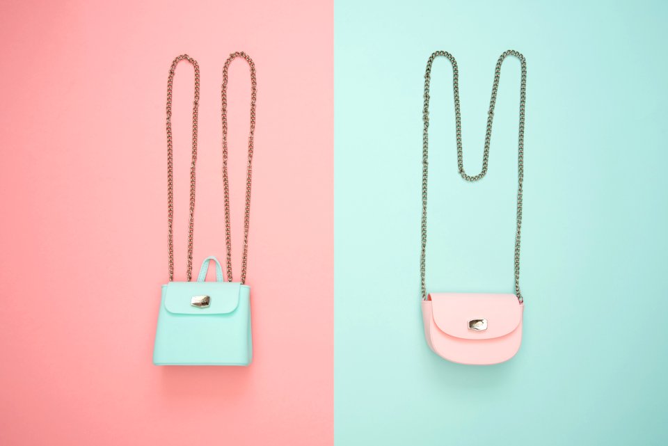 Photo Of Two Teal And Pink Leather Crossbody Bags