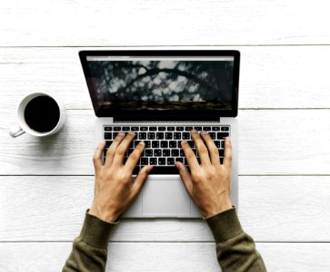Person Using Macbook Pro