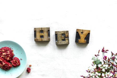 Three Brown Wooden Letters Wall Decor photo