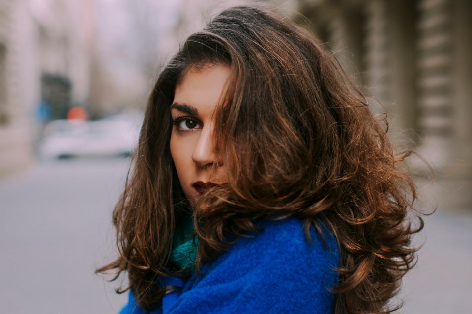 Focus Photo Of Woman In Blue Top
