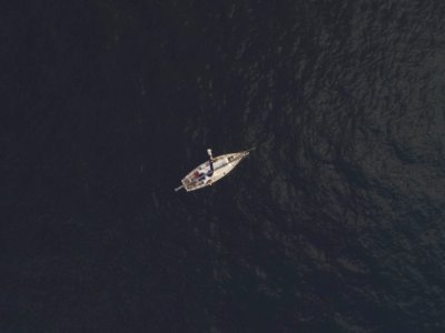 Top View Photography Of Sailboat photo