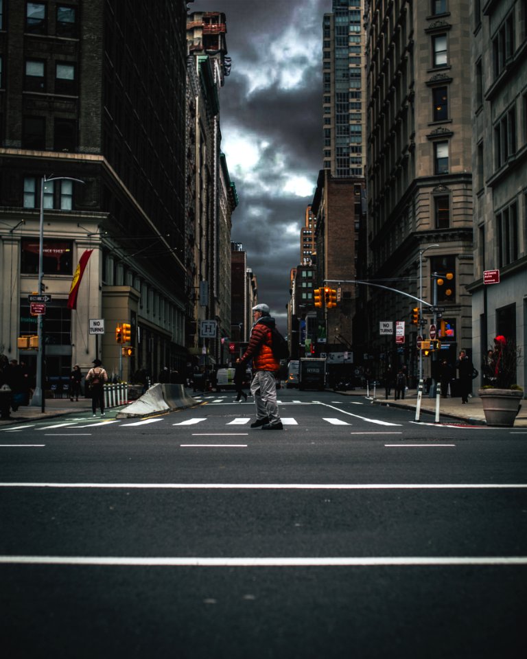 Photo Of Man Crossing The Sreet