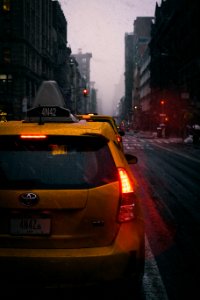 Close-Up Photography Of Yellow Toyota Hatchback On Road