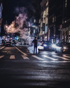 Photo Of Man In The Middle Of The Road photo