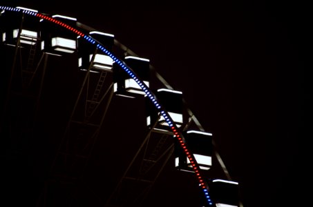 Photography Of Ferris Wheel At Night photo