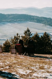 Photo Of Two Woman Sitting On Folding Chair