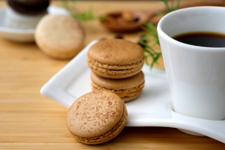 Three Cookies Beside Cup Of Coffee photo