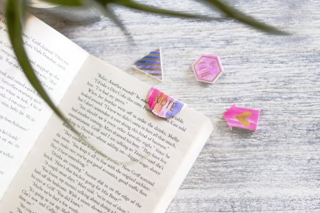 Opened Book With Pink Note Bookmark photo
