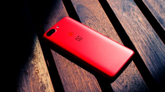 Close-Up Photography Of Red Mobile Phone