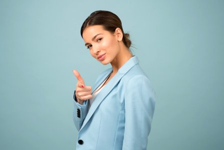 Woman Wearing Blue Shawl Lapel Suit Jacket photo