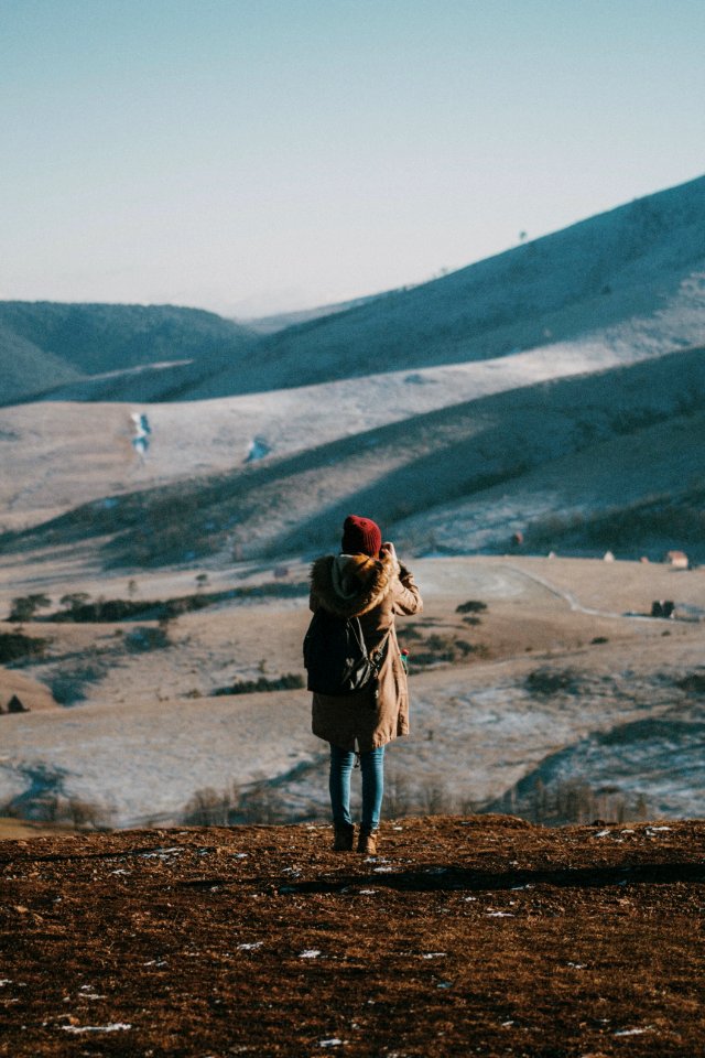 Photo Of Woman Taking Pictures