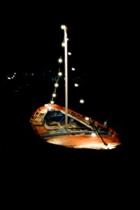 Photography Of Light Bulbs On Boat photo