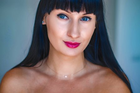 Photo Of Woman With Blue Eyes And Black Hair