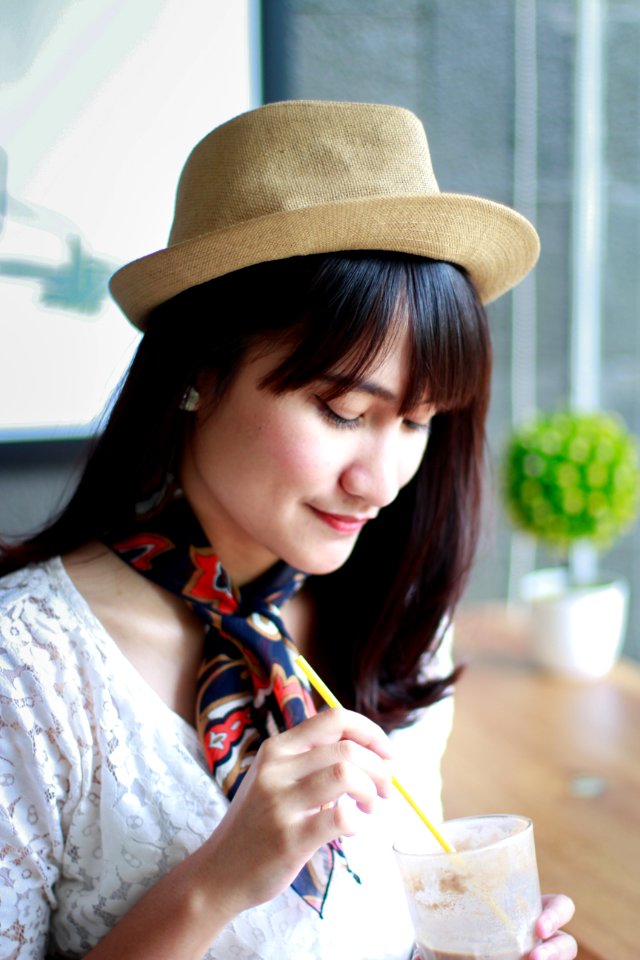 Close-Up Photography Of A Woman Wearing Hat photo